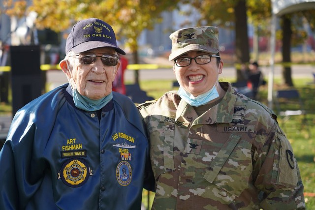 Col. Santee Vasquez, Tank-automotive and Armaments Command chief of staff, poses with World War II local Navy veteran Art Fishman during the Metropolitan Detroit Veterans Coalition Virtual Armed Services Salute 2020 event held Nov. 8 in Roosevelt Park adjacent to Detroit’s historic Michigan Central Train Depot. The size-limited event was videotaped and will be made available for viewing on Veterans Day at www.MDVCMI.org.