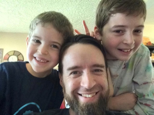Anthony Johnson, technical writer-editor (engineering) with the U.S. Army Corps of Engineers&#39; Portland District, in 2010 with their two sons, Ebin (far left), currently 12, and Ethan (far right), currently 16.