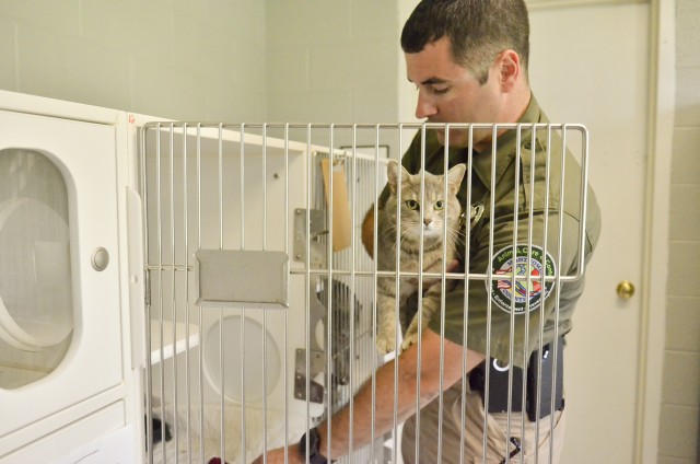 Justin Slate, animal control officer, cares for a cat waiting for adoption at the Fort Campbell An-imal Shelter. Fort Campbell’s first intergovernmental support agreement was signed June 6, 2019, when Montgomery County Animal Care and Control...