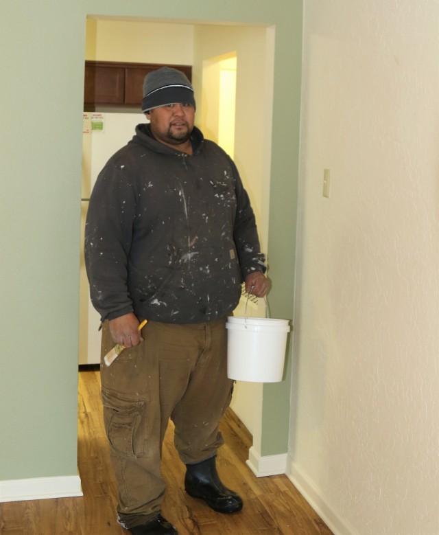 Tenali Hicks, a North Haven maintenance team member, conducts repairs and applies paint to a recently vacated unit Oct. 14. A native of Waianae, Hawaii, Hicks has been in Delta Junction for nearly three years. “I love it here,” said Hicks. “I wouldn’t want to be anywhere else.” Privatized residential housing on Fort Greely is owned by the Lendlease Corporation and operated by North Haven Communities.
