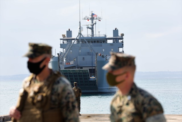 Logistics Support Vessel-4 Lt. Gen. William B. Bunker, 8th Theater Sustainment Command, arrives to Kin Red Beach Training Area Oct. 31, during exercise Orient Shield 21-1. U.S. Army and U.S. Marines embarked and disembarked multiple M142 High Mobility Artillery Rocket Systems onto LSV-4 to execute live rapid deploying equipment training in the Ryukyu southwest archipelago island chain. Orient Shield 21-1 is the largest U.S. Army field training exercise in Japan that tests and refines multi-domain operations. (U.S. Army photo by Maj. Elias M. Chelala)