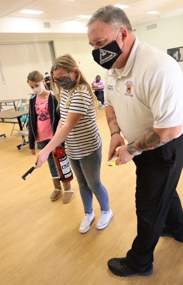 Local Girl Scouts learn basic fire, medical first aid techniques from firefighters