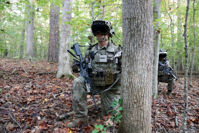 Soldier dons the Capability Set 3 (CS 3) militarized form
factor prototype of the Integrated Visual Augmentation System (IVAS) during a Soldier Touchpoint 3 (STP 3) squad reconnaissance mission test event at Fort Pickett, Va., in October 2020.