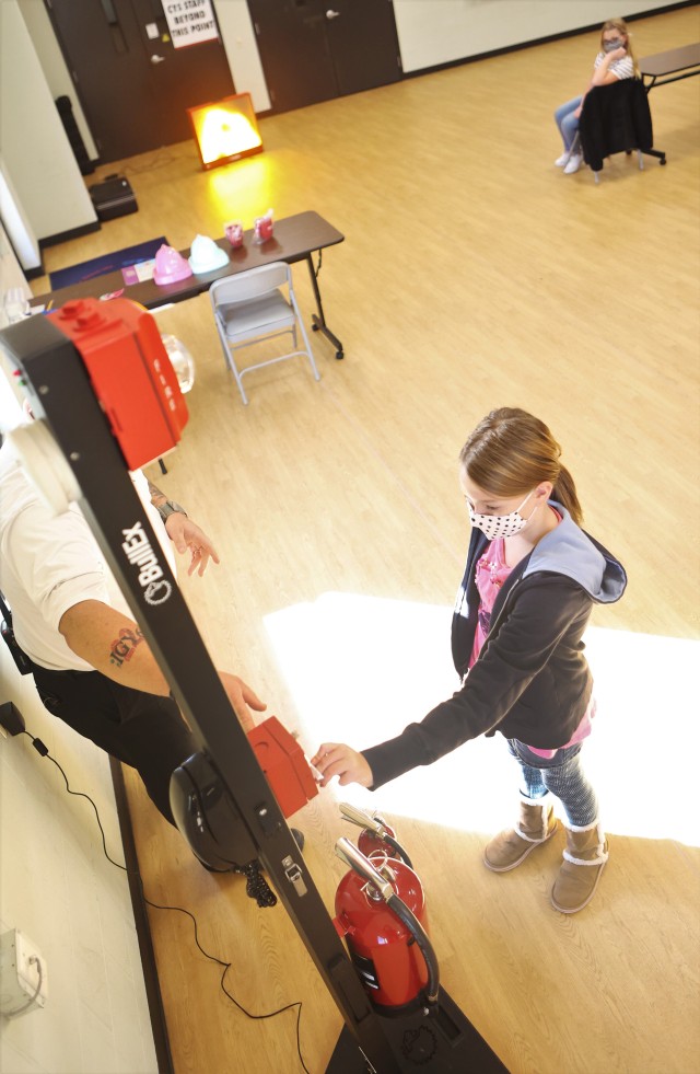 Local Girl Scouts learn basic fire, medical first aid techniques from firefighters