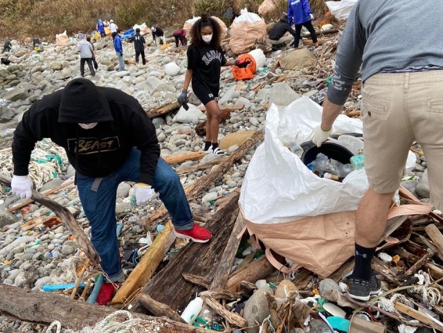 Soldiers from the 14th Missile Defense Battery at the Kyogamisaki Communication Site at Kyotango-Shi, Japan, picks up trash as part of a community cleanup of Suisho-hama Beach, Nov 8. The battery, operated by the U.S. Army Space and Missile...