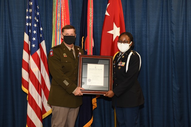 AMC Deputy Commander Presents Award To JROTC Cadet