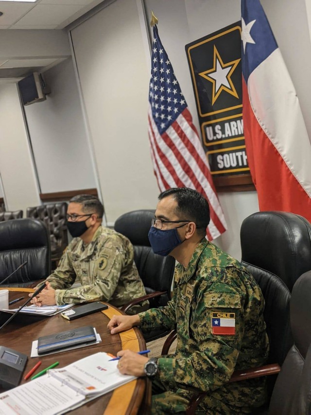 Col. Andrew Rendon, U.S. Army South, and Col. Jorge Salinas, Chilean Army Liaison Officer, listens to opening remarks at the beginning of the U.S.-Chilean Army Staff Talks.
...