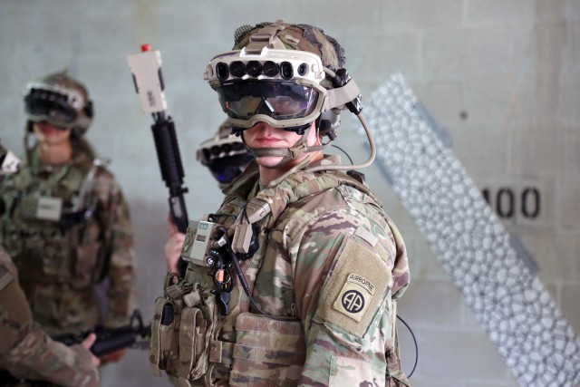 Soldiers don the Capability Set 3 (CS3) militarized form factor prototype of the Army’s Integrated Visual Augmentation System (IVAS) and wield a Squad immersive Virtual Trainer (SiVT) during a training environment test event at its third Soldier Touchpoint (STP 3) at Fort Pickett, Virginia.