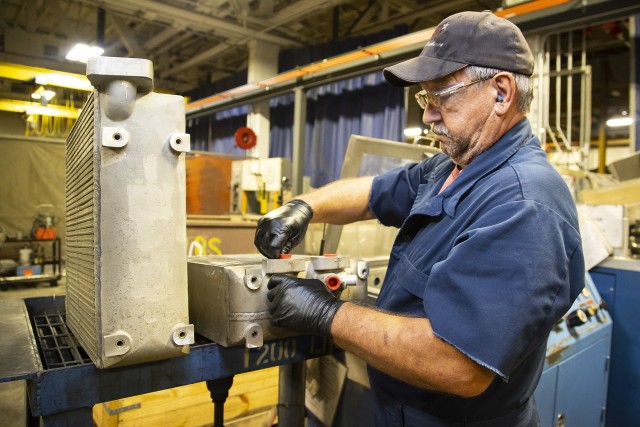 Shipping containers used to deliver components to the warfighter