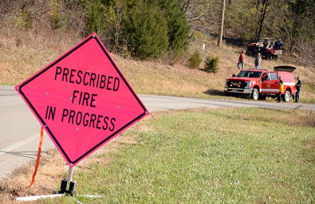 Fort Leavenworth Fire and Emergency Services and Directorate of Public Works personnel assemble for a prescribed burn along a multi-use trail Nov. 17 on Sheridan Drive. The small prescribed burn along the trail will help restore the prairie aspect...