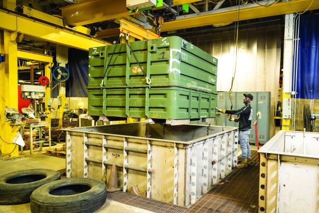 Shipping containers used to deliver components to the warfighter