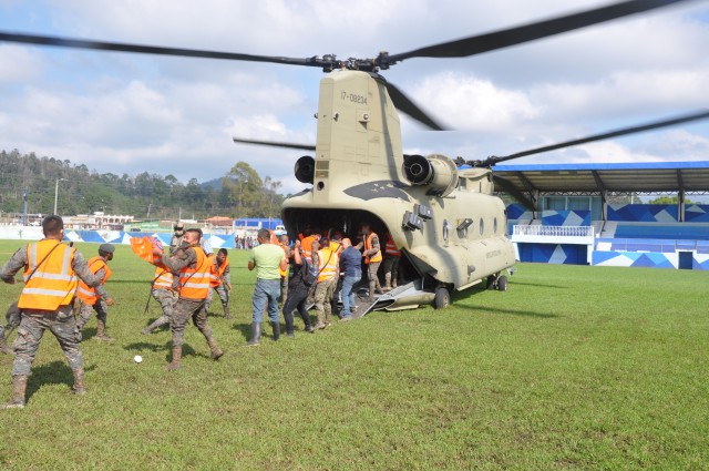 Partnering with the government of Guatemala, a U.S. CH-47 Chinook assigned to the 1-228th Aviation Regiment, Joint Task Force-Bravo, delivered 10,000 pounds of essential food and water to San Cristobal City, Guatemala, Nov. 8, 2020, to assist the...