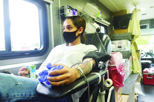 Ilse Zapata gives blood April 22, 2020, in the American Red Cross bloodmobile at Fort Campbell. Because of the COVID-19 pandemic many blood drives were canceled in 2020, but Fort Campbell has hosted 28 blood drives during the year with more...