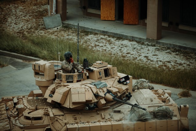 Troopers assigned to 1st Battalion, 12th Cavalry Regiment, 3rd Armored Brigade Combat Team, 1st Cavalry Division, engage an opposing force during the testing of the newest version of the Bradley Fighting Vehicle, Fort Hood, Texas, Oct. 24, 2020. Operational testing with the U.S. Army Operational Test Command (OTC), places First Team Troopers in a series of maneuvers and engagements where OTC can properly test the new vehicles. (U.S. Army photo by Sgt. Calab Franklin, 3ABCT, 1CD, PA NCOIC)