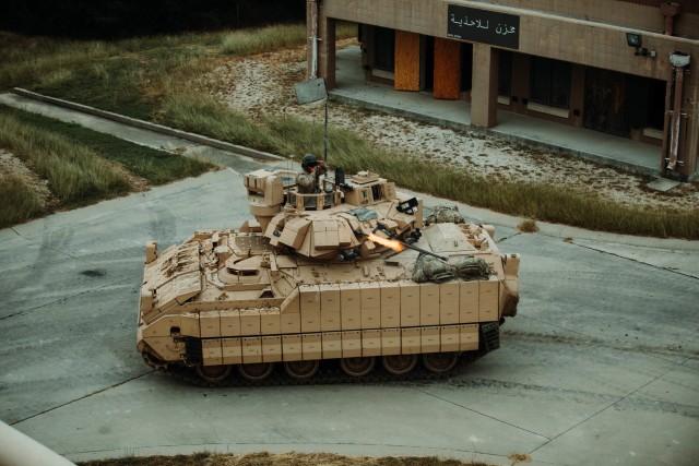 Troopers assigned to 1st Battalion, 12th Cavalry Regiment, 3rd Armored Brigade Combat Team, 1st Cavalry Division, engage an opposing force during the testing of the newest version of the Bradley Fighting Vehicle, Fort Hood, Texas, Oct. 24, 2020. Operational testing with the U.S. Army Operational Test Command (OTC), places First Team Troopers in a series of maneuvers and engagements where OTC can properly test the new vehicles. (U.S. Army photo by Sgt. Calab Franklin, 3ABCT, 1CD, PA NCOIC)