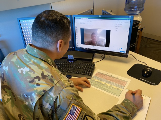 Master Sgt. Jose A. Feliciano, Ordnance senior career manager, reviews Cadet Jacob Ziadeh&#39;s video interview on the virtual branch orientation portal. Ziadeh&#39;s interview was 1 of 700 interviews submitted to the Ordnance branch for consideration.
