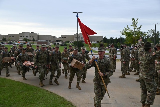 Recruits starting training here to become cavalry scouts run to the finish of an event Sept. 25 designed to instill teamwork and attention to detail on their first day of training. Called the "Thunder Run," the event replaces the traditional "shark attack" in which drill sergeants swarmed newly arrived trainees and shouted orders and belittling comments to gain immediate compliance. The 194th Armored Brigade, which trains the Army's 19 Kilo armor crewmen and 19 Delta cavalry scouts, adopted the Thunder Run several months ago as a replacement for the shark attack, which had come to be viewed as an outmoded vestige of the Vietnam-era military draft.