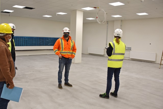 WIESBADEN, Germany – (From left to right) Derick Ferrer, postal operations supervisor; Klaus Hahn, chief of construction, Directorate of Public Works; Chad Adamson, construction control representative with the U.S. Army Corps of Engineers Europe...