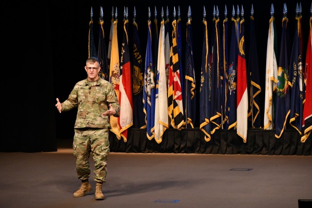 Lt. Gen. James Rainey, Commanding General, U.S. Army Combined Arms Center, outlines his command’s priorities during a hybrid workforce-town-hall at Fort Leavenworth, Nov. 19, 2020. Rainey’s team limited the in-person gathering to 30 people at the Lewis and Clark Center due to COVID but streamed the town hall on Microsoft Teams to over 1,100 participants.