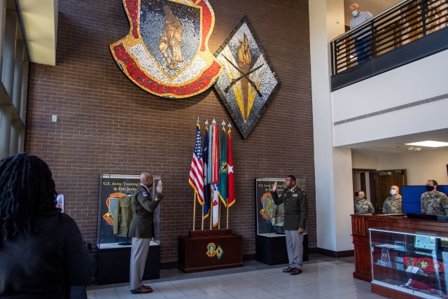 Brig. Gen. Milford "Beags" Beagle Jr. administers the oath of office to Maj. Raymond Colston during his promotions ceremony Nov. 19.