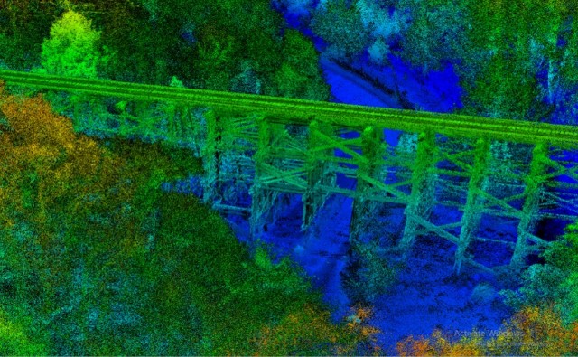 Geospatial engineers building 3D models in complex environments