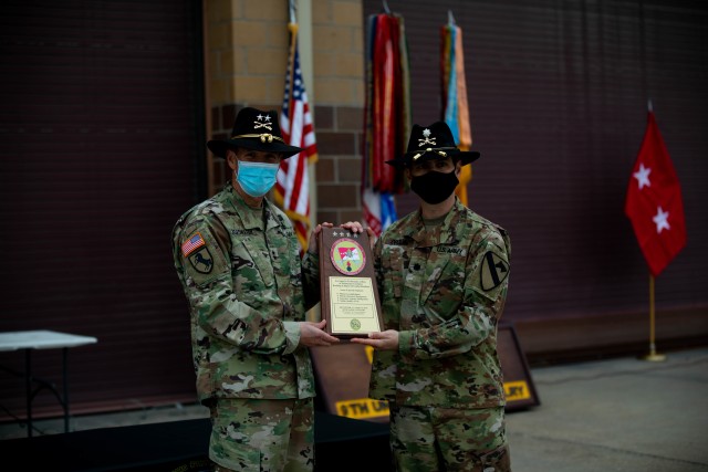Maj. Gen. Jeffery Broadwater, Commanding General of the 1st Cavalry Division, presents the Army Award for Maintenance Excellence (AAME) to Lt. Col. Derek G. Drouin, Commander of 6th Squadron, 9th Cavalry Regiment “Sabers”, 3rd Armored Brigade...