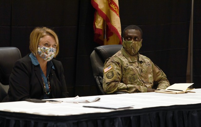 Garrison Command Sgt. Maj. Algrish Williams watches as Judy Boley, manager of Fort Jackson Family Homes, speaks during the virtual Community Town Hall Nov. 17. Boley and other housing updated the Fort Jackson community about issues affecting on-post housing.