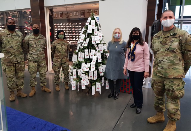 Volunteers from the Sergeant Morales Club, 66th Military Intelligence Brigade and Army Community Service set up an Angel Tree Nov. 24 at the Exchange on Hainerberg. Trees are expected to go up at the Clay and Hainerberg chapels Nov. 25.