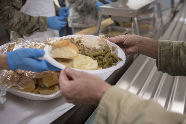 Airmen, Soldiers, veterans and their families gather for the Chaplains Thanksgiving Dinner Nov. 15, 2018 at Gowen Field, Boise, Idaho. The annual event is held to provide a free holiday meal and build esprit de corps amongst those who have served and are currently serving. 