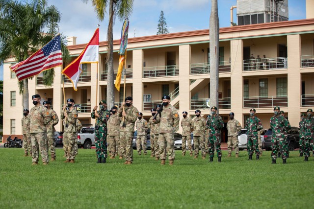 Soldiers assigned 3rd Squadron, 4th Cavalry Regiment, 3rd Infantry Brigade Combat Team, 25th Infantry Division and the Indonesian 431st Para Raider Infantry Battalion conduct the closing ceremony for the 2020 Indonesia Platoon Exchange at Schofield Barracks, Hawaii on Nov. 24, 2020. (U.S. Army photo by Staff Sgt. Alan Brutus)