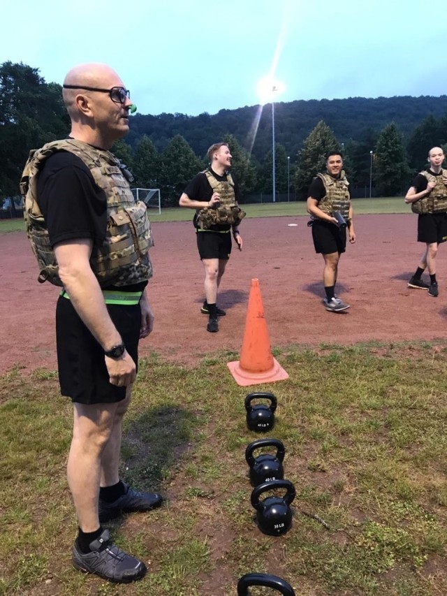1SG Michael Woolley, a combat medic and tactical combat casualty care instructor, carries out a training exercise with Soldiers of C Co., Landstuhl Regional Medical Center to help them “get comfortable being uncomfortable” with different aspects of tactical combat casualty care.