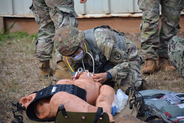 Tripler soldier exhibits #prideinthepatch while administering during a medical simulation.