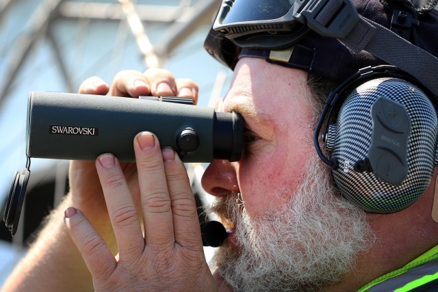 Tulsa District Biologist Stacy Dunkin uses binoculars to search the landscape while counting Interior Least Tern nests on a sand bar in the Arkansas River June 15, 2020.  The U.S. Army Corps of Engineers, Tulsa District is responsible for...