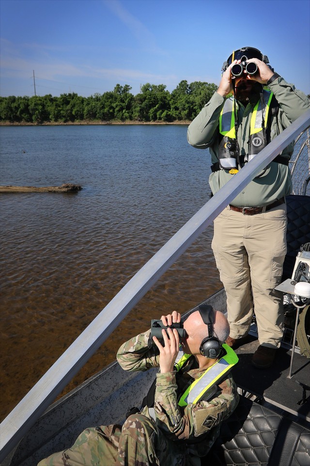 Tulsa District Biologist Jason Person (top) and District Commander Col. Scott Preston look for Interior Least Tern nests on a sand bar in the Arkansas River June 15, 2020.  The U.S. Army Corps of Engineers, Tulsa District is responsible for...