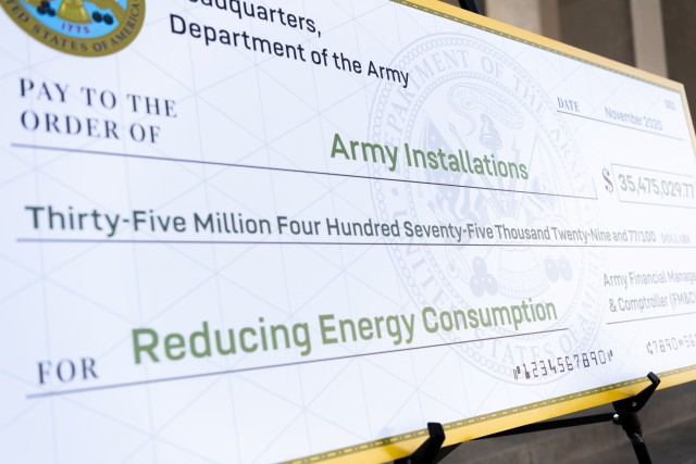 U.S. Army senior leaders meet for a group photo to hand off a check for the Resilient Energy Funding for Readiness and Modernization at the Pentagon in Arlington, Va., on Nov. 24, 2020.  (U.S. Army photo by Spc. Zachery Perkins)