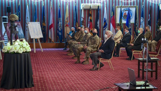 Ambassador John Abizaid, the U.S. Ambassador to the Kingdom of Saudi Arabia, and Maj. Gen Wendul Hagler, the Defense Attaché, maintain pandemic safety protocols as they attend the 25th anniversary remembrance ceremony, held on 12 Nov., at Eskan Village in Saudi Arabia.  The annual event is hosted by the Office of the Program Manager for the Saudi Arabian National Guard (OPM-SANG), to remember and honor those OPM-SANG and local national employees that were injured or killed in the 1995 terrorist bombing in Riyadh, Saudi Arabia. This year marked the 25th (Nov. 13, 1995) anniversary of the bombing that destroyed the former OPM-SANG headquarters and killed eight personnel. (Courtesy photo)