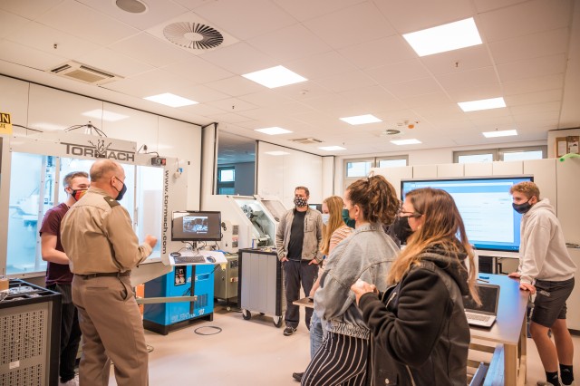 WIESBADEN, Germany-Brian Barnes, technology teacher at Wiesbaden High School, describes the partnerships the school has established with contracting companies and garrison units that bring additional human resources to the classroom to enhance...