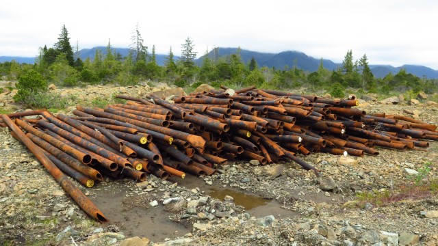 Removed pipeline sits in a pile waiting to be removed from Annette Island as part of cleanup effort accomplished by the Metlakatla Indian Community under the Native American Lands Environmental Mitigation Program. Items removed as part of the...