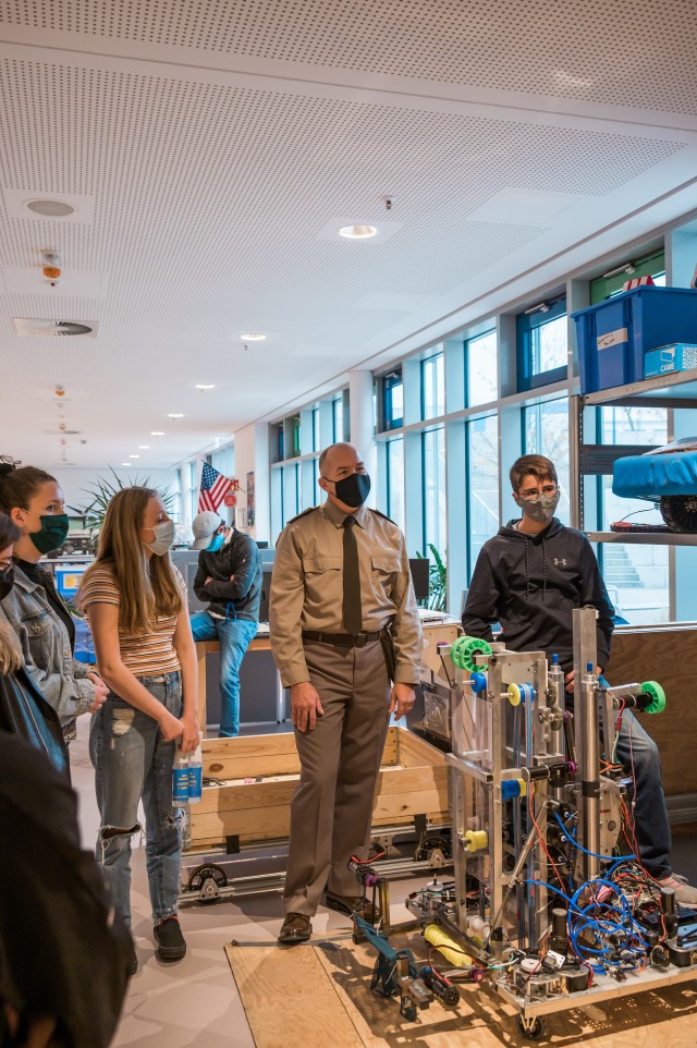 WIESBADEN, Germany-Brig. Gen. Jed Schaertl, discusses the FIRST robotics program with students at Wiesbaden High School.