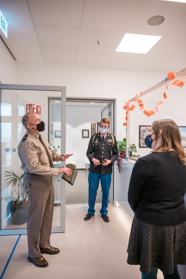 WIESBADEN, Germany – Brig. Gen. Jed Schaertl begins the tour by explaining to Dr. Heather Ramaglia, principal, and Sam Houston, senior and S3 Sgt. Maj. of the JROTC, that he has an affinity for education, as both of his parents were teachers. He...