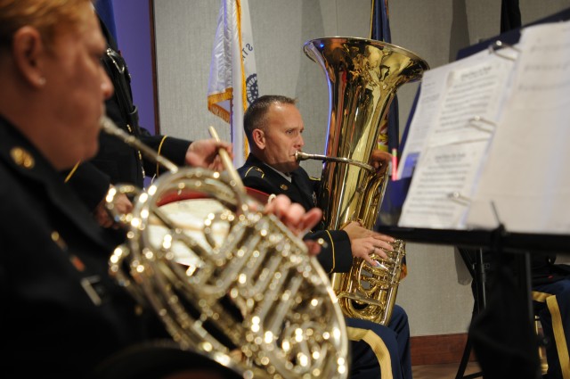 U.S. Army Reserve Sgt. 1st Class Jason Butler, a tuba player with the 380th Army Reserve Band, plays patriotic music to welcome guests to the 64th annual Commonwealth’s Veterans Day Ceremony at the Virginia War Memorial in Richmond, Va., Nov....