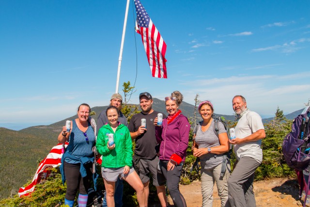 Members of Fort Devens RFTA and their family and friends joined 48 other groups across New Hampshire in a September 11th Memorial Hike. This hike is to honor those that lost their lives with a tribute: by flying the American flag atop all 48 four-thousand foot and higher mountains in New Hampshire. After a strenuous hike to the top of Mt. Flume we flew the flag for 2 hours and in the distance could see the flag atop Mt. Liberty.