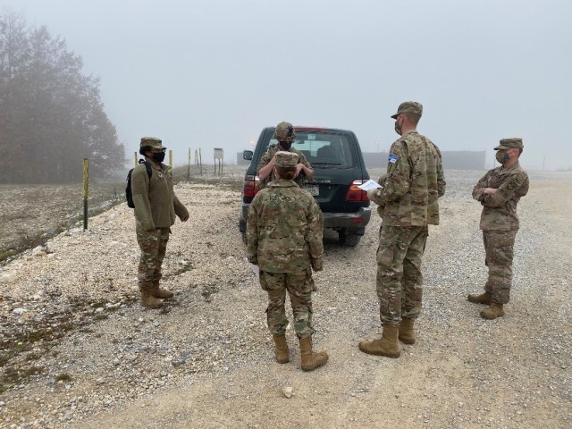 U.S. Army Soldiers Capt. Andrew Sahol and Spc. Imani Newsome with the 566th Medical Company (Area Support) instruct Soldiers during K9 tactical combat casualty care training at Camp Bondsteel, Kosovo, on Nov. 21, 2020. The training gave K9 handlers with the 100th Military Police Detachment the basic knowledge to provide emergency aid to their animals. (Courtesy photo)