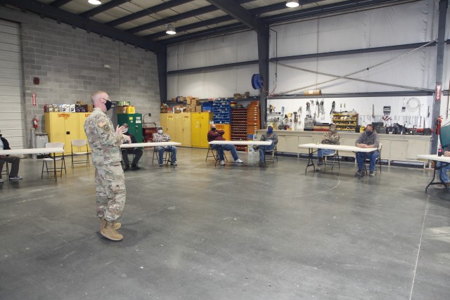 Col. Bill Hannan, commander, Kansas City District, USACE, addressed the team during the awards presentations at the Missouri River Area Office in Napoleon, Mo. Significant overtime including weekend work went into the district response to Missouri...