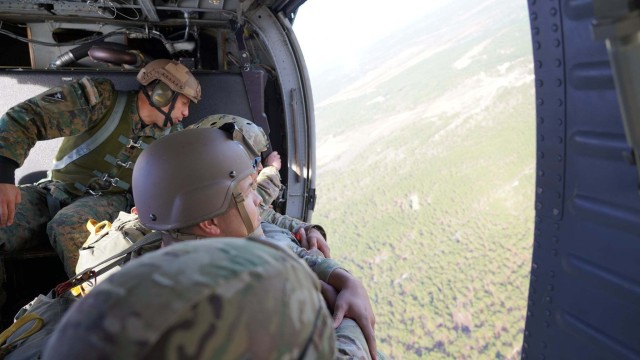 Soldiers from the United States Special Operations Command community take part in Airborne Operations, as part of Operation Toy Drop, hosted by the 95th Civil Affairs Brigade, Special Operations, Airborne, at Fort Bragg, N.C., December 4, 2020....