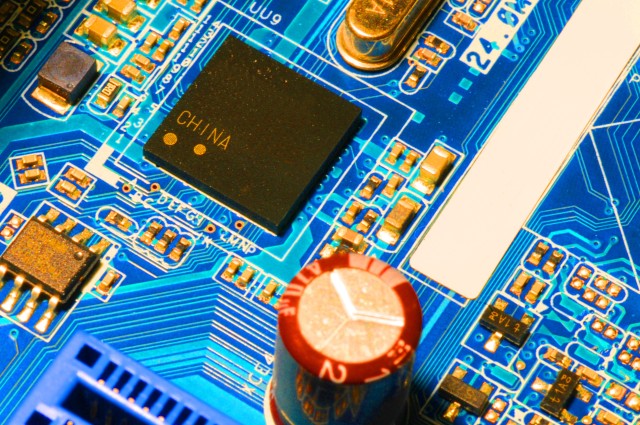 A circuit board. Microelectronics are critical to U.S. defense.