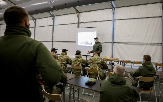 “Welcome to Lithuania,” said Vadimas Jeriominas, Chief of Staff for the Lithuanian Motorized Infantry “Griffin” Brigade during a Dec. 4, 2020 meet and greet with senior leaders of 2nd Battalion, 8th Cavalry Regiment, 1st Armored Brigade...