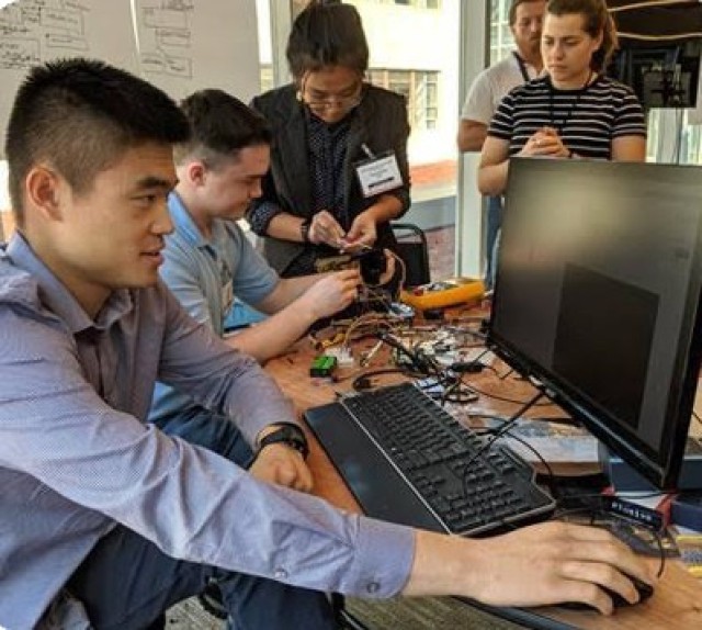 MIT Cadets work work on the Nightcrawler's control systems.