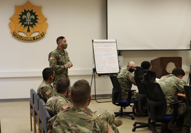 U.S. Army Command Sgt. Maj. Frank Guerrero III, assigned to 4th Squadron, 2d Cavalry Regiment, teaches a block of instruction during the 2d Cavalry Regiment Platoon Sergeant University in Vilseck, Germany, Dec. 4, 2020. The course aimed to develop...