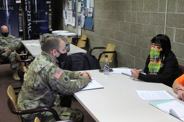 Civil affairs Soldiers participate in a simulated key leader engagement Oct. 30, 2020, in a classroom in building 50 as part of a 38A Civil Affairs Military Occupational Specialty-Transition Course at Fort McCoy, Wis. The course is coordinated by...